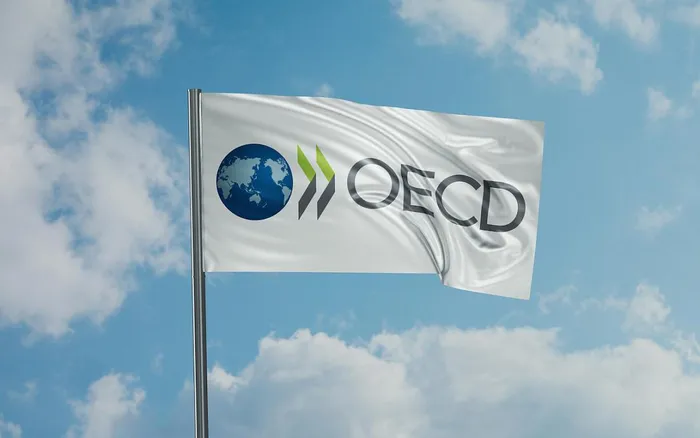 OECD hạ dự báo tăng trưởng